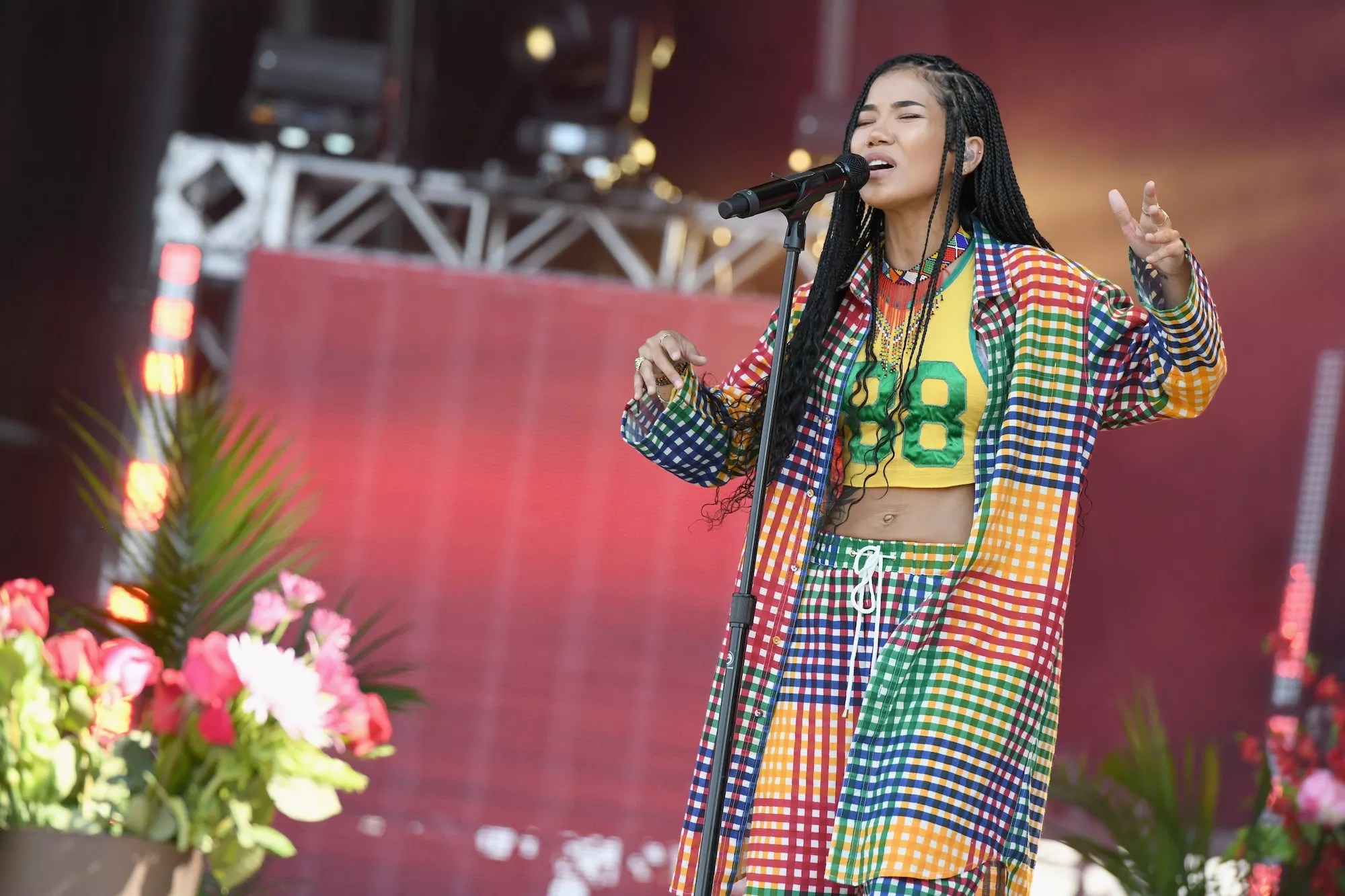 Jhené Aiko performing on stage
