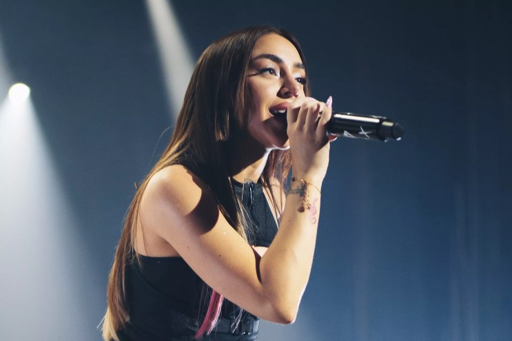 Nicki Nicole performing on stage at the Fillmore Miami Beach