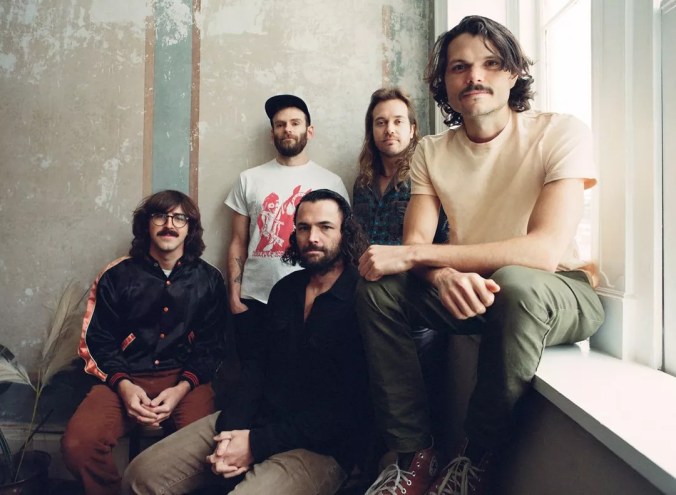 Portrait of the band members of Goose