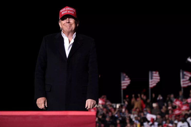 Former President of the United States Donald Trump speaking with supporters at a "Save America" rally at Country Thunder Arizona in Florence, Arizona, January 17, 2022