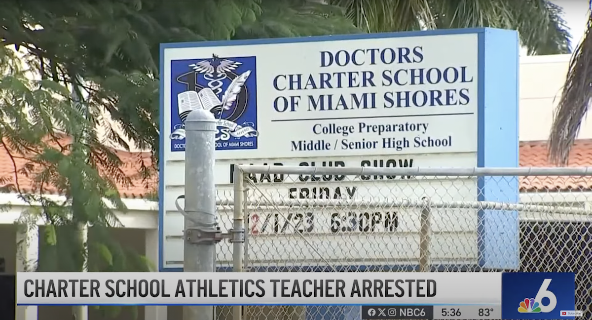 screenshot of news shot of sign outside the school