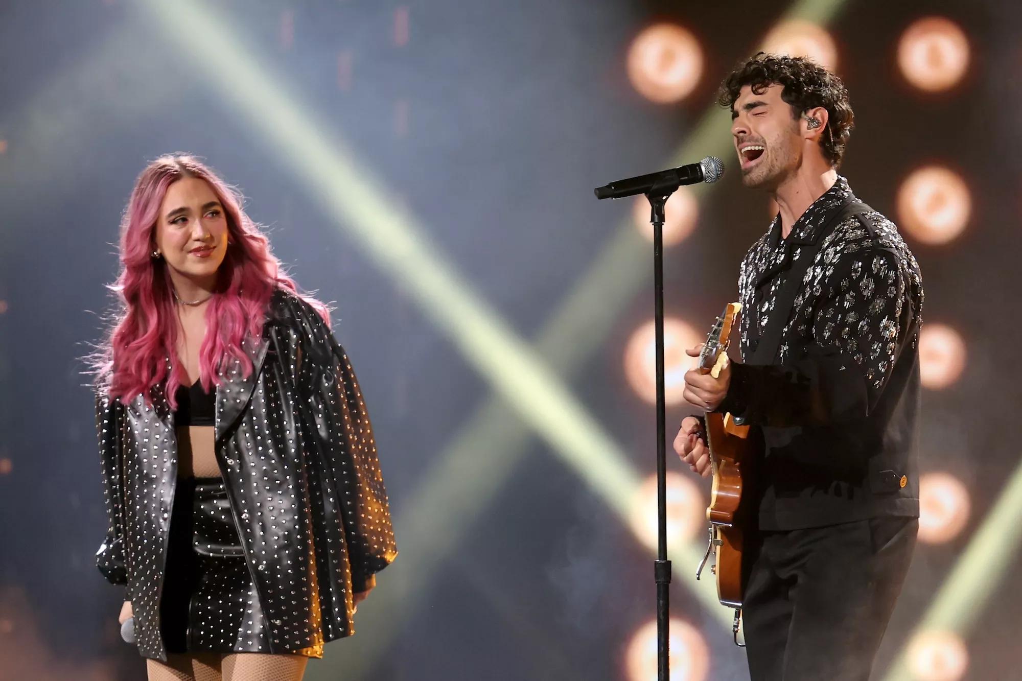 Joe Jonas and Ela Taubert onstage at the Latin Grammys in Miami