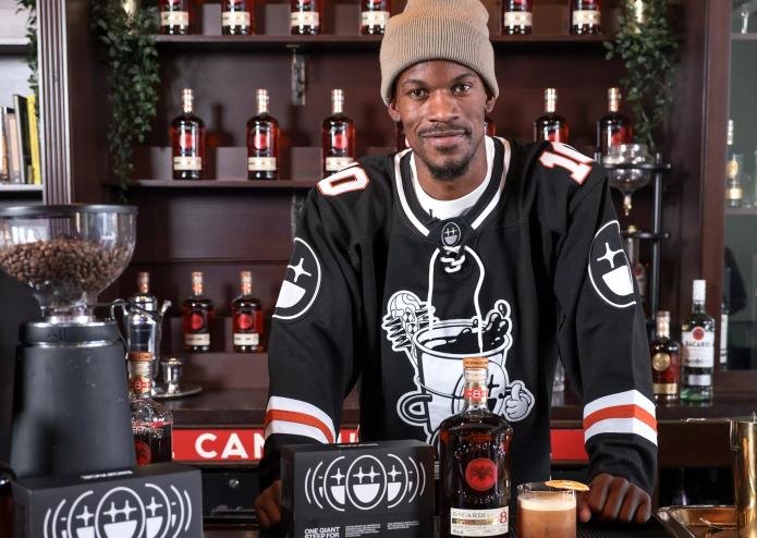 man holding alcohol