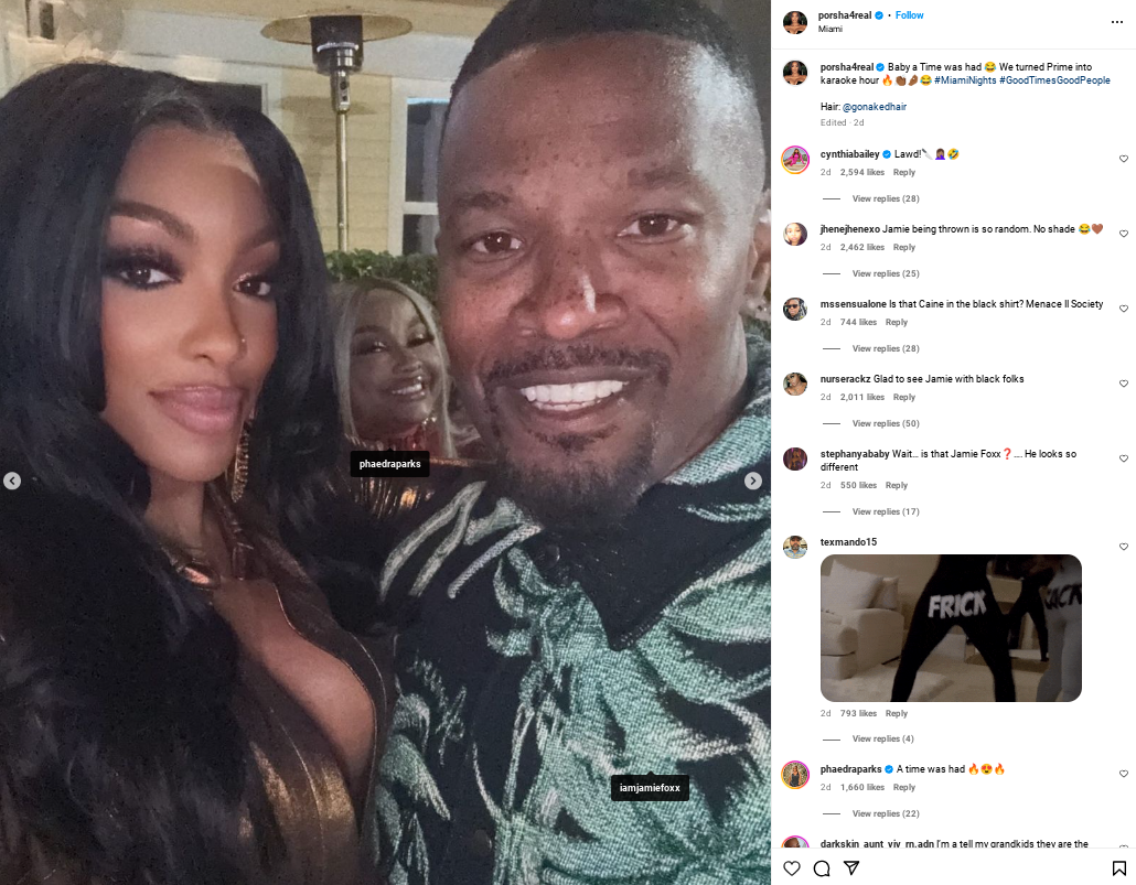 Porsha Williams poses for a selfie with Jamie Foxx, who wears a tropical print shirt, while Phaedra Parks smiles in the background at Miami’s Prime 112.