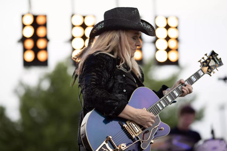 Melissa Etheridge performing on stage