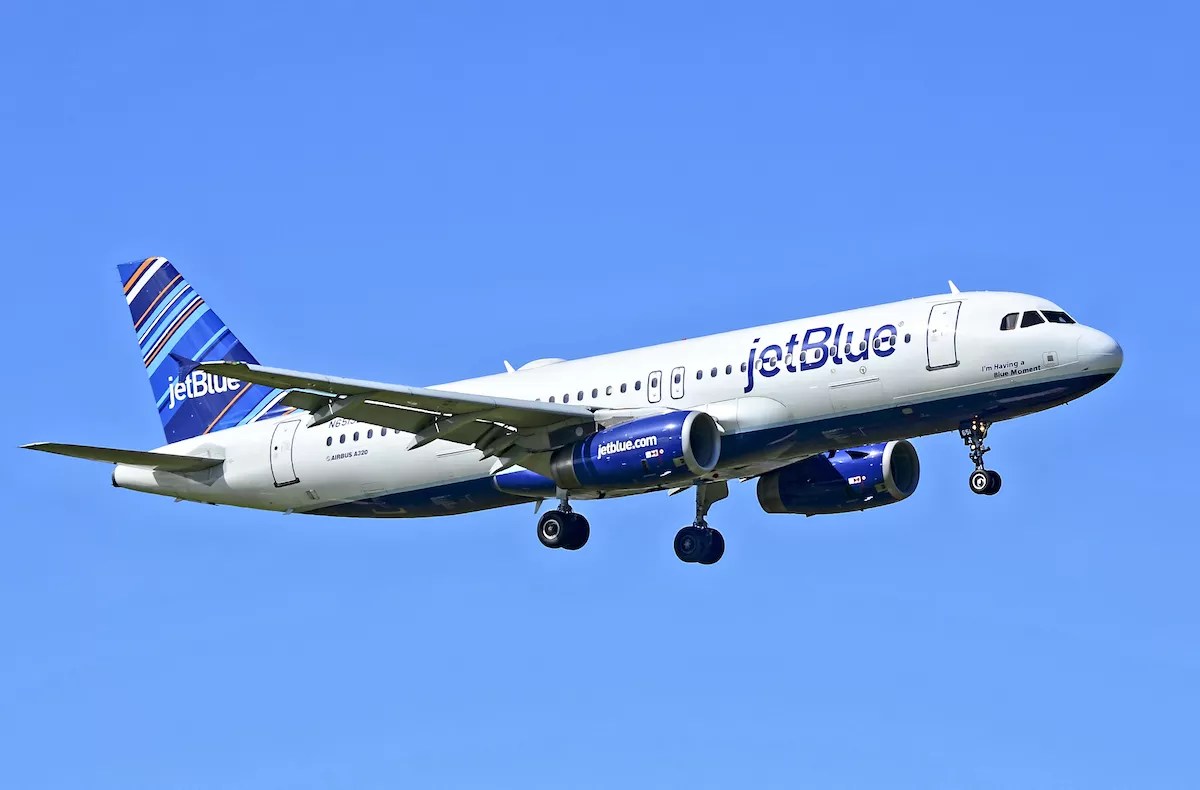 A JetBlue flight in air. Two bodies were discovered in the wheel well of a JetBlue flight that arrived in Fort Lauderdale from New York on Monday evening.
