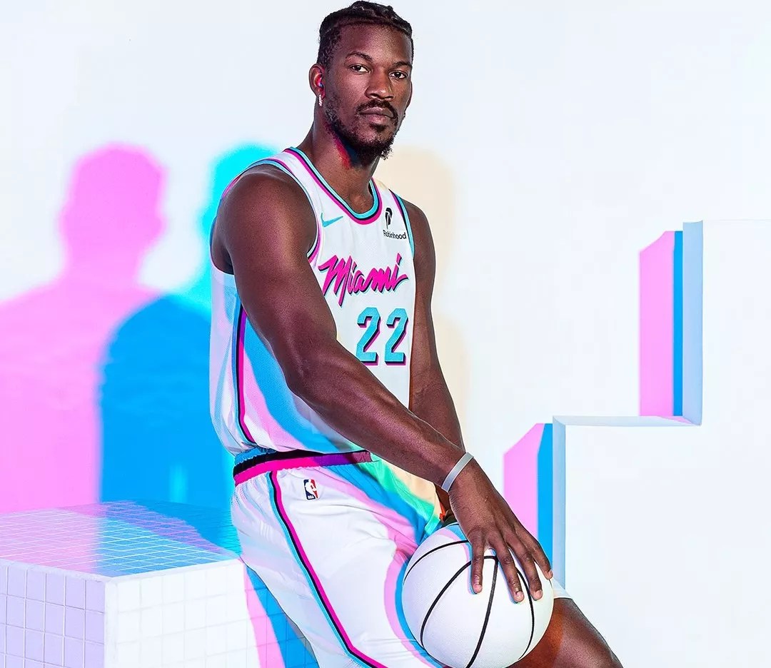 Jimmy Butler models the Miami Heat's rebooted white <i>Miami Vice</i>-inspired uniforms.