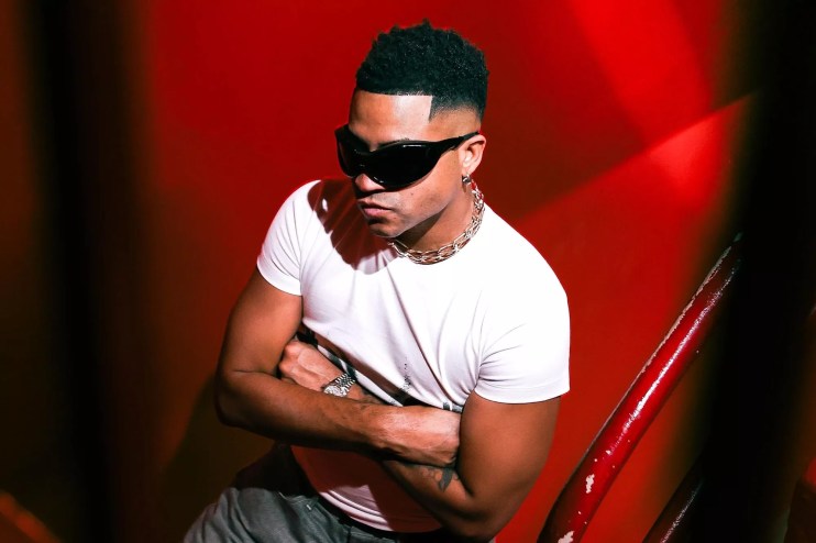 Portrait of producer Caleb Calloway standing in a stairwell