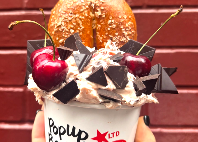 bagel and cream cheese in cup