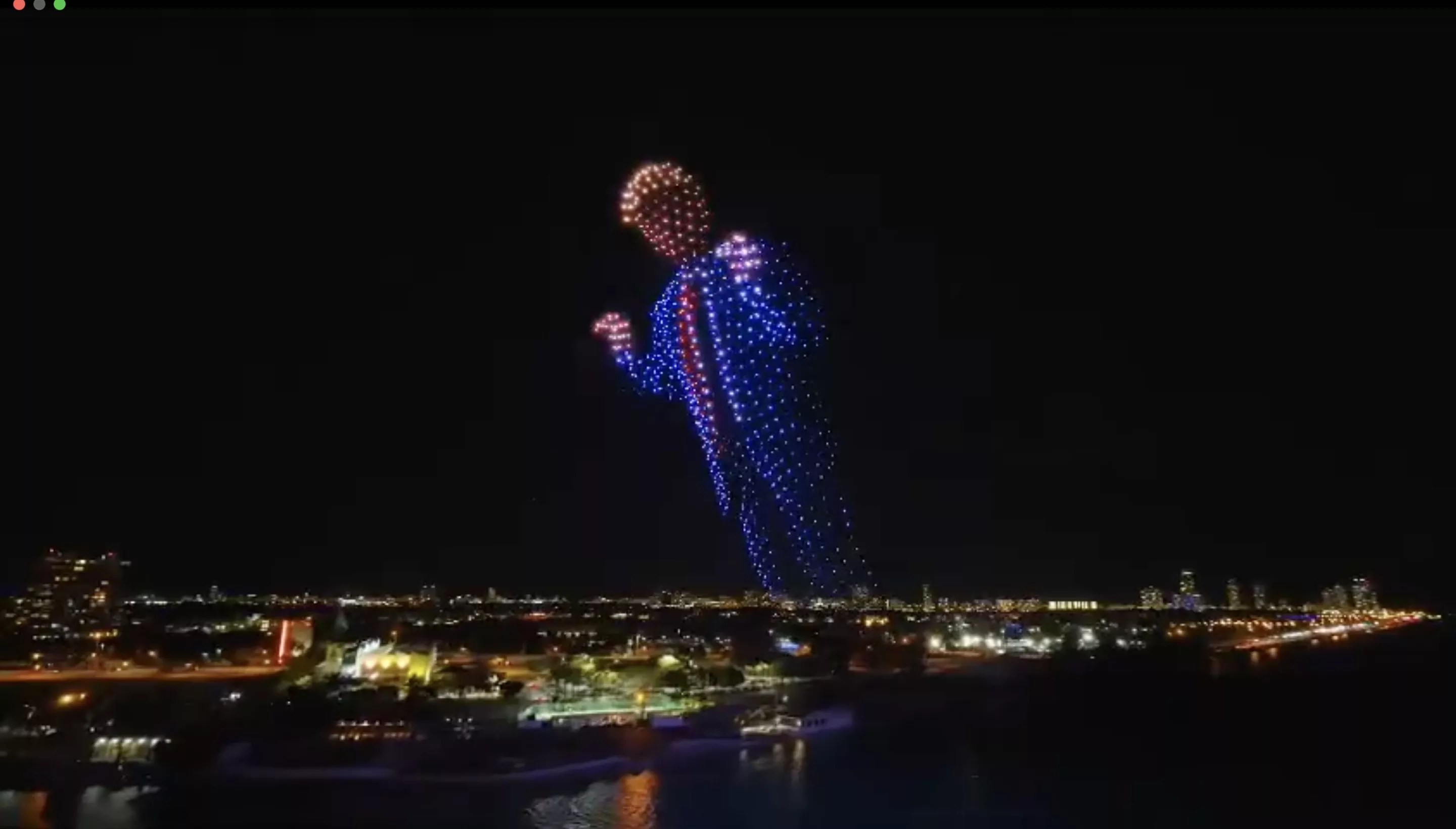 clip from a purported drone show over Biscayne Bay east of Brickell and the Port of Miami, featuring a likeness of Donald Trump doing his often-imitated YMCA dance