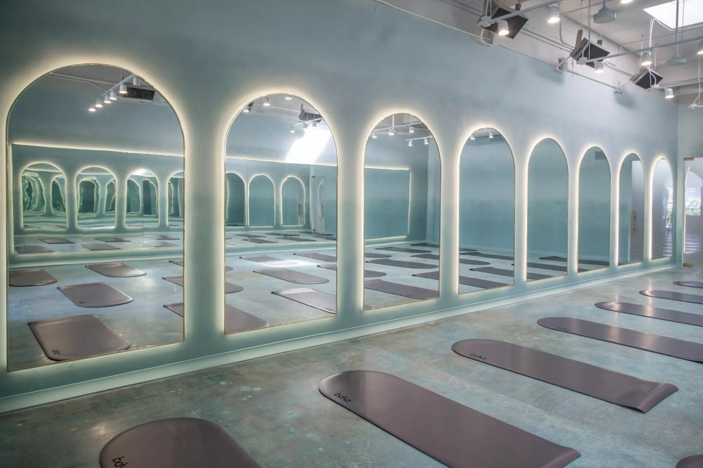 a room with domed mirrors and domed mats on the ground