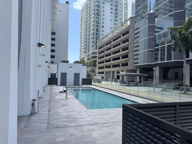 A ground-level pool next to CVS in Brickell