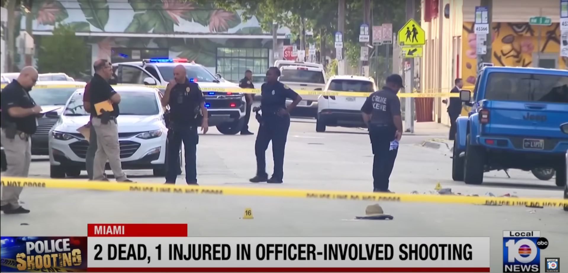 A screenshot of a TV news report showing police officers standing around the crime scene in Wynwood.