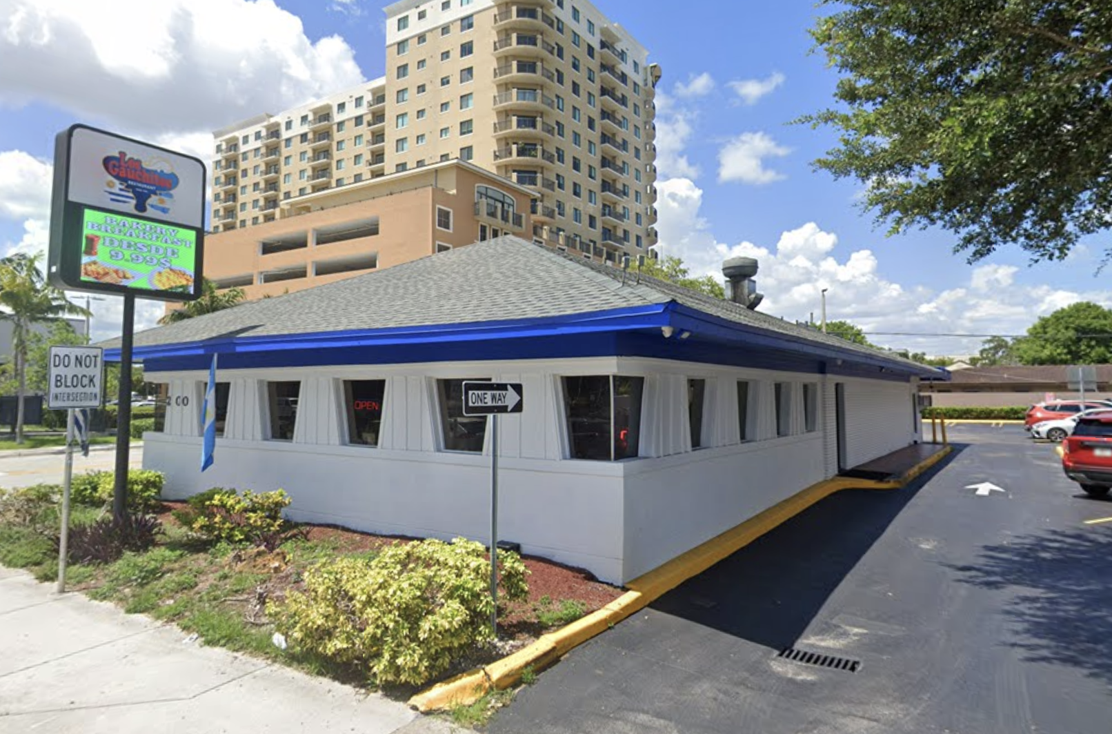 a blue and white triangular building