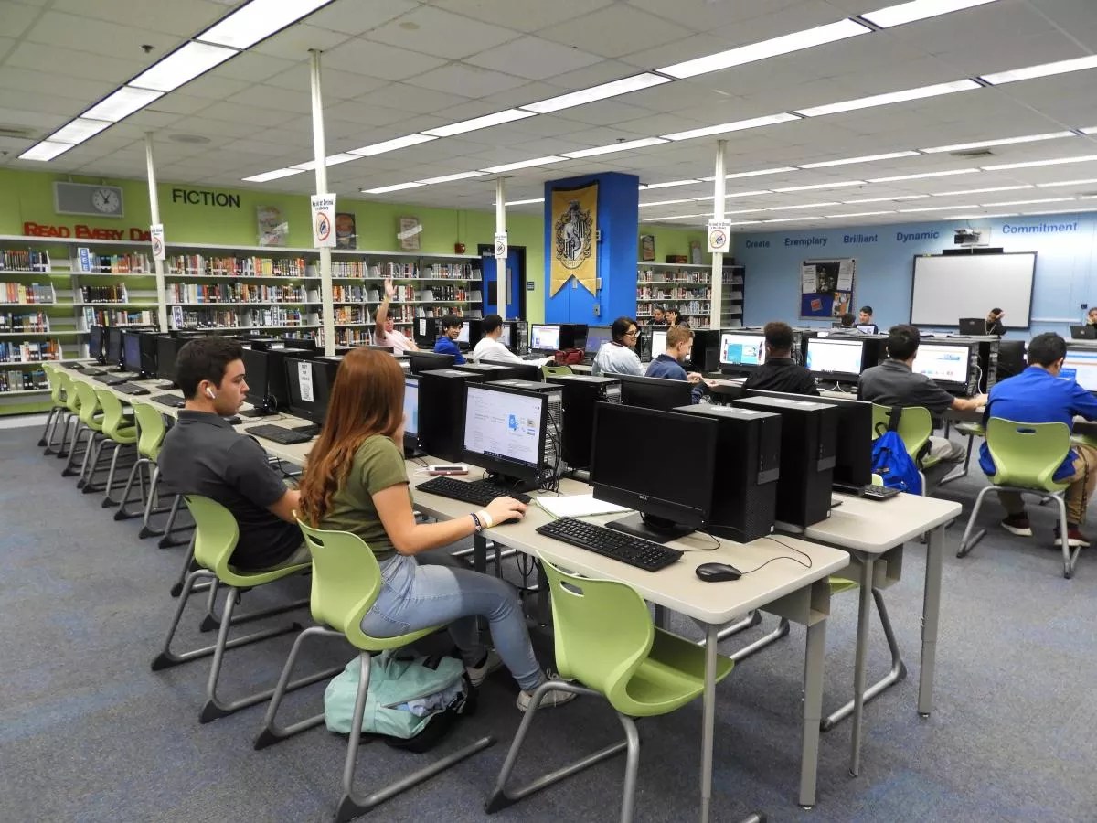 Pictured are high school students working on computers in a computer lab in a Hialeah high school.