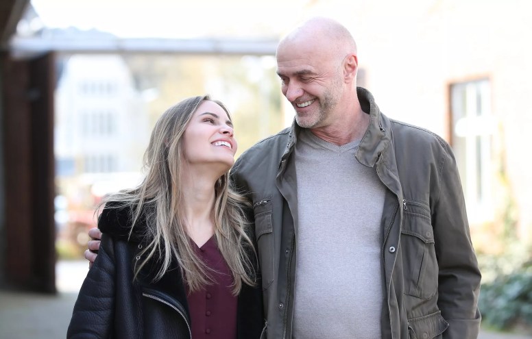 photo of a young woman gazing lovingly into the eyes of an older man