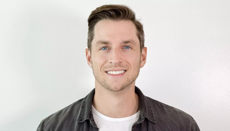 a portrait of a man in front of a white background