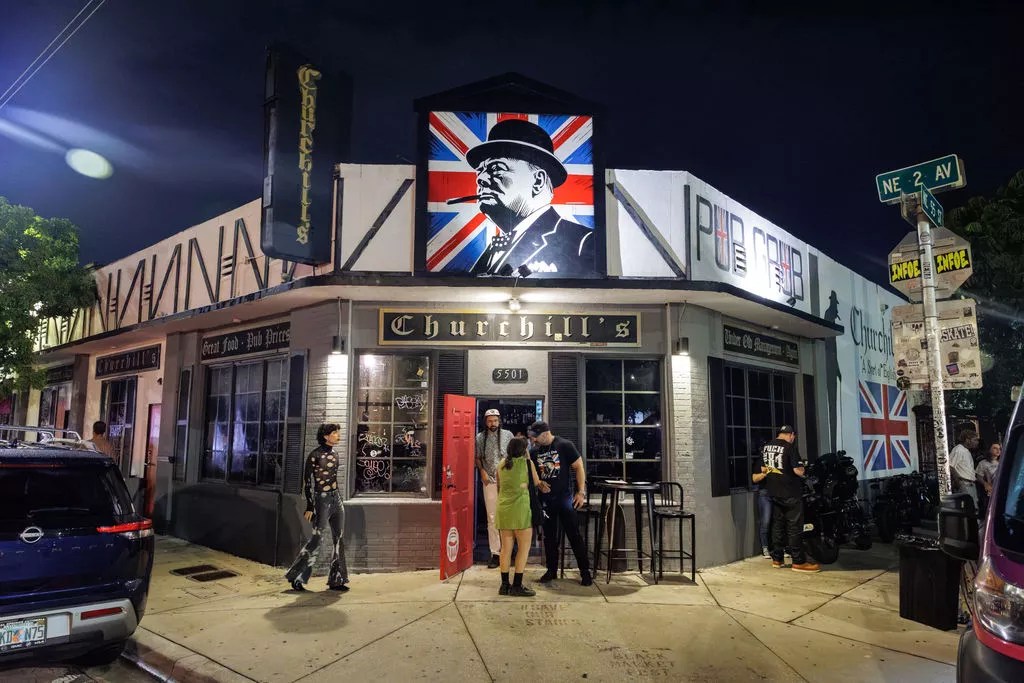Photo of the outside of a building with a sign that reads Churchill's
