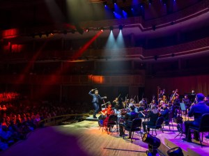 Picture of an orchestra in stage.