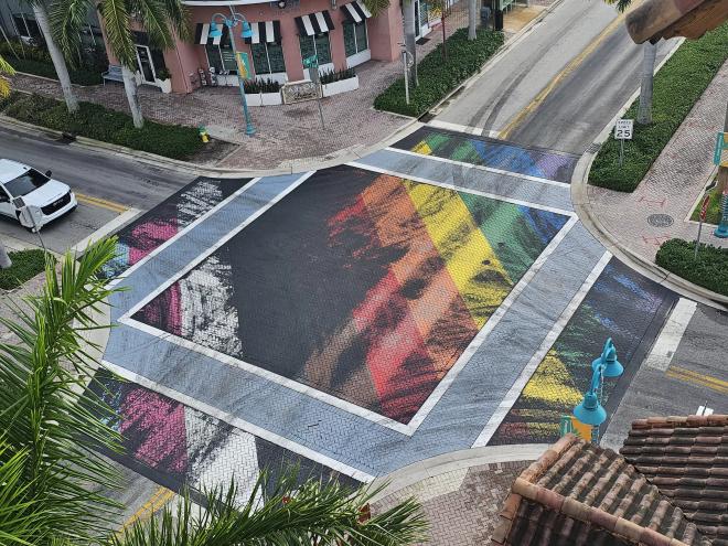 Depicted is a blacked-out pride street display in Delray Beach.