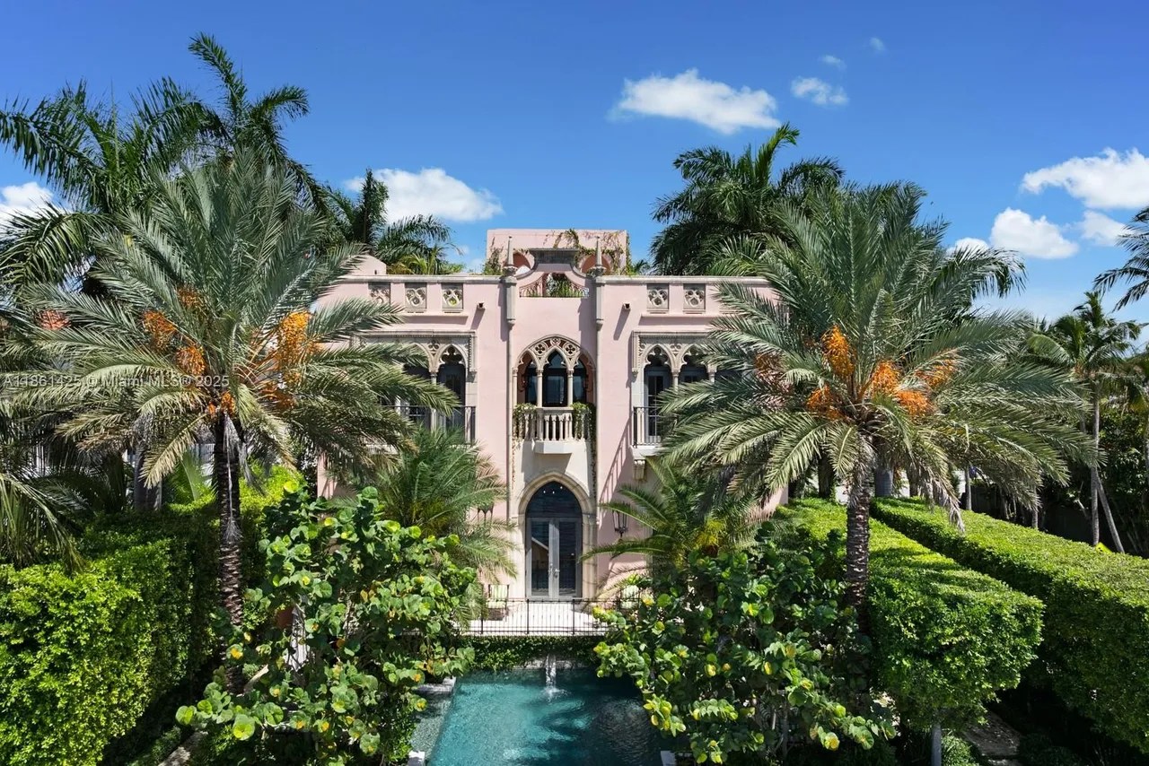 Depicted is an opulent gothic-style mansion in Coconut Grove.