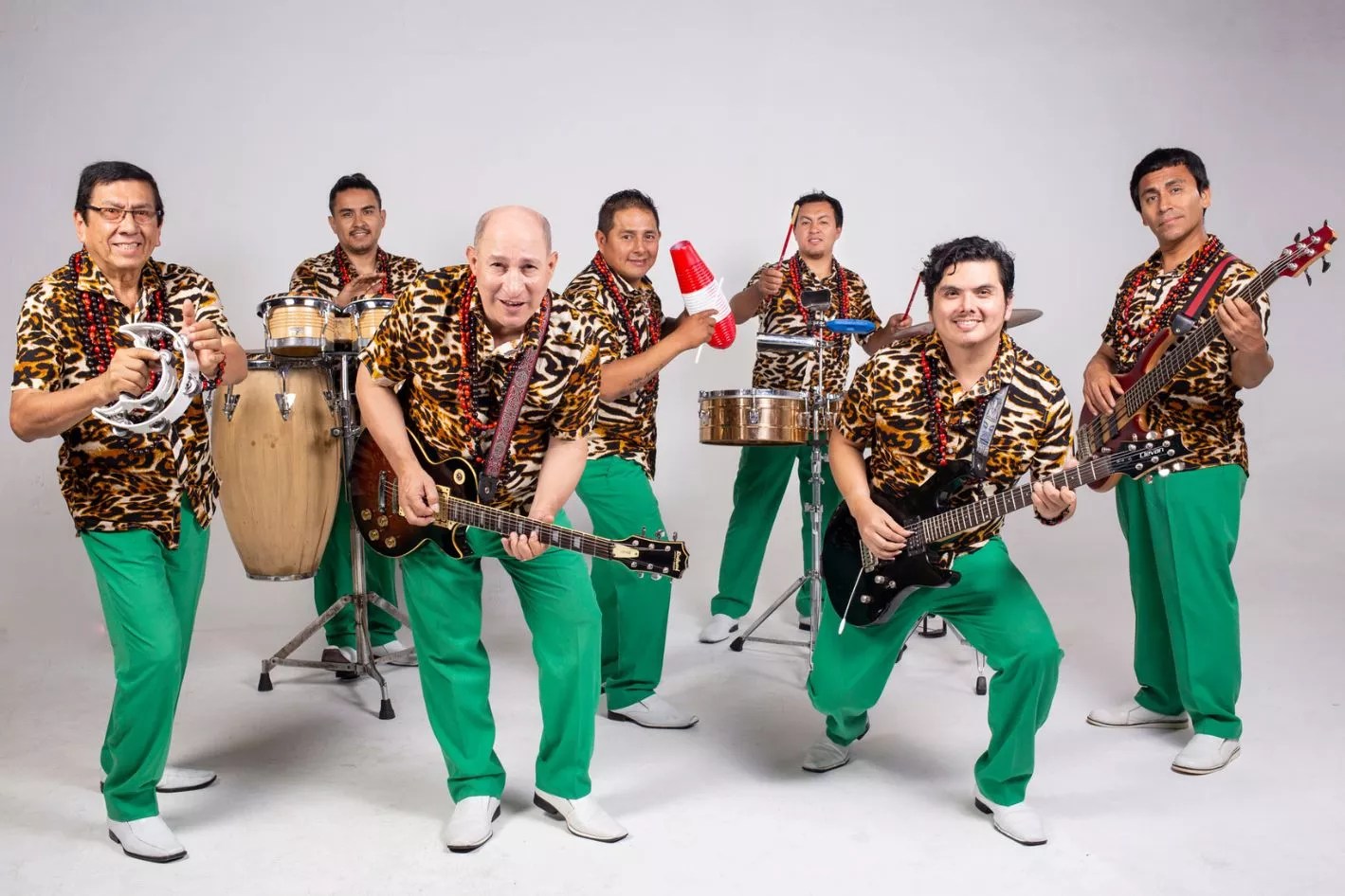 Picture of a seven piece tropical band.